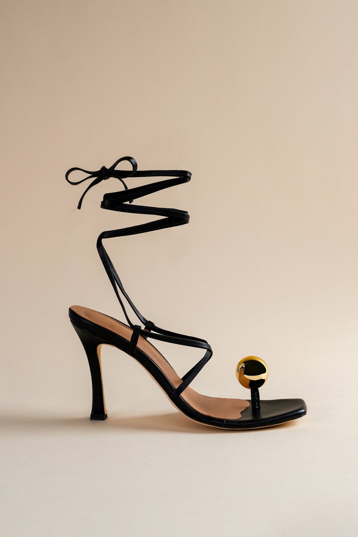Globe sandal in black nappa leather and golden globe